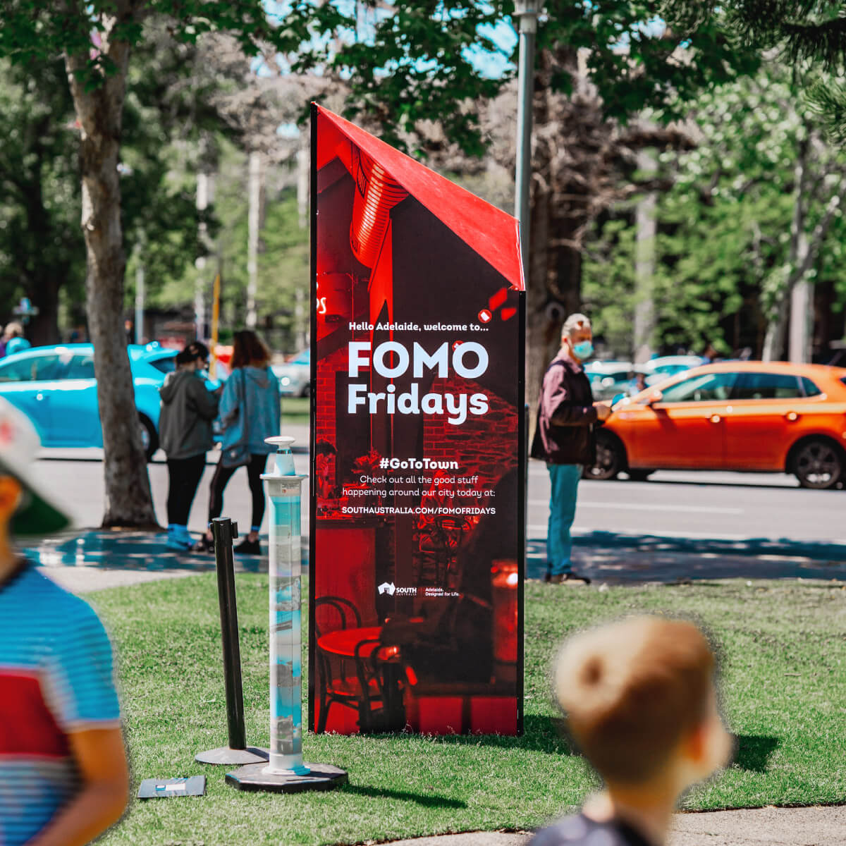 Red plinth with Go To Town branding advertising FOMO Fridays