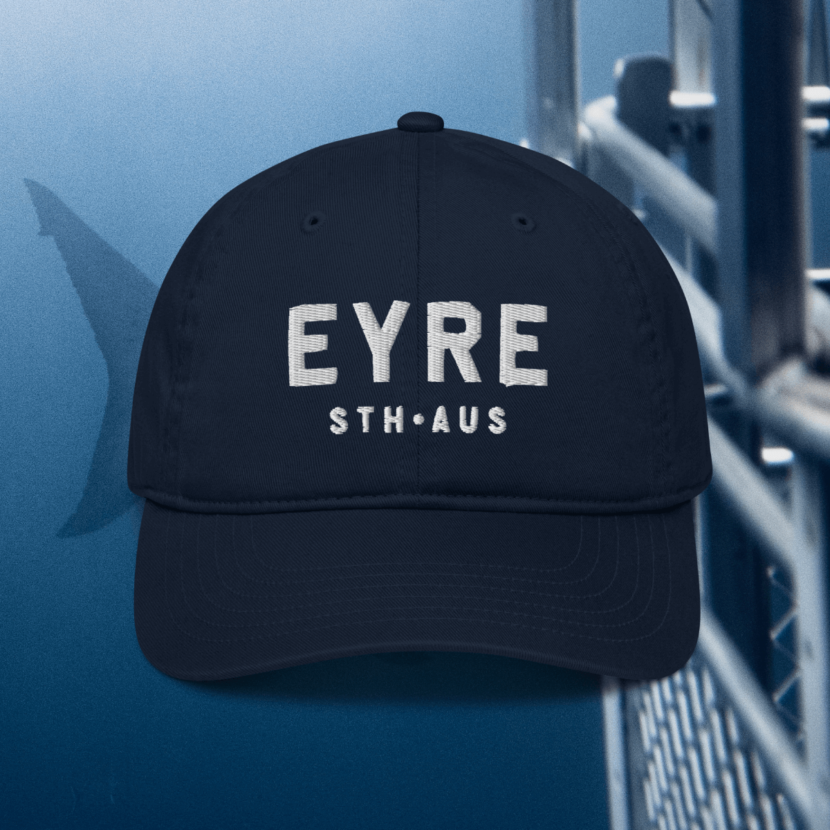 Navy cap with 'Eyre - STH AUS' embroidered