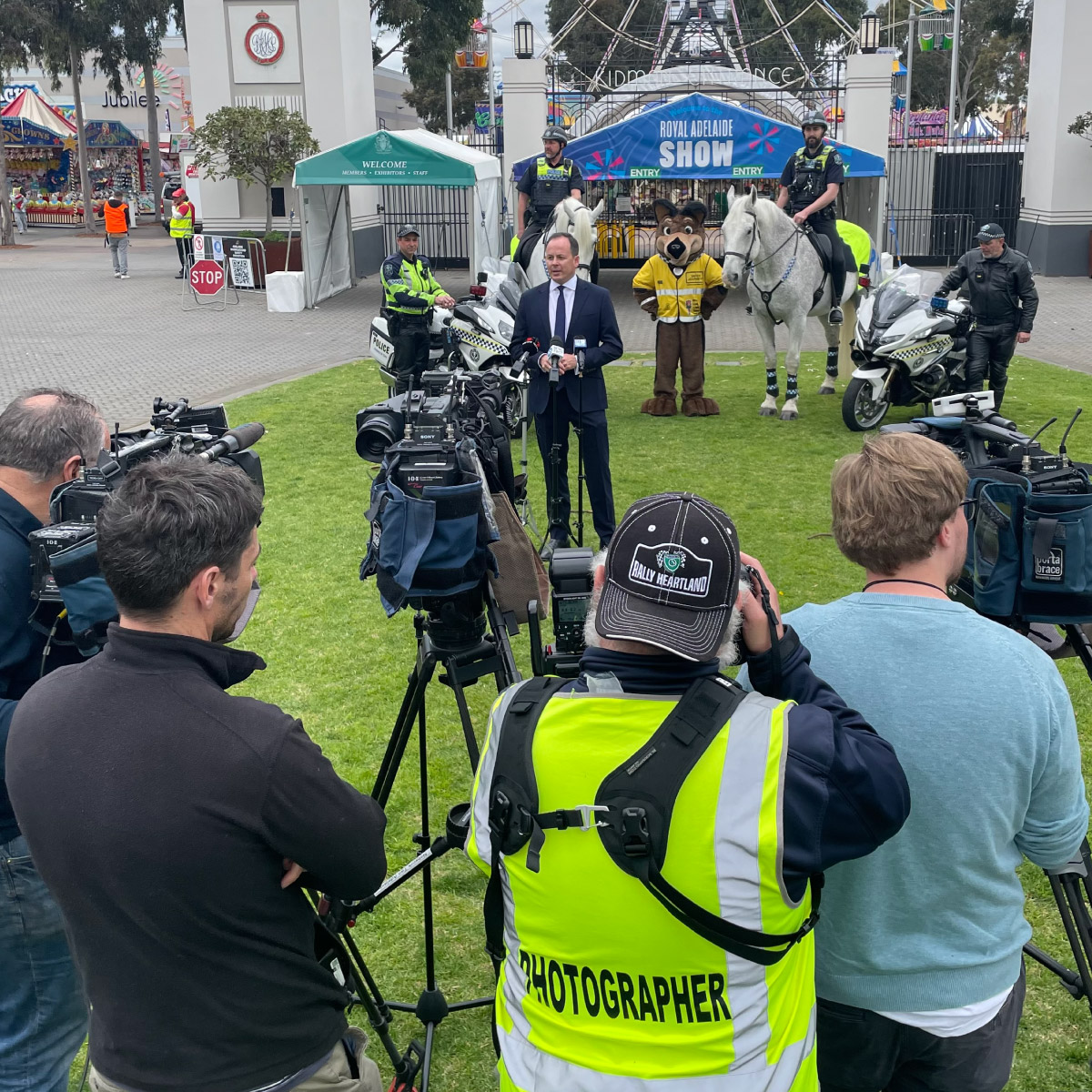 News reporter reporting from the Royal Adelaide Showgrounds