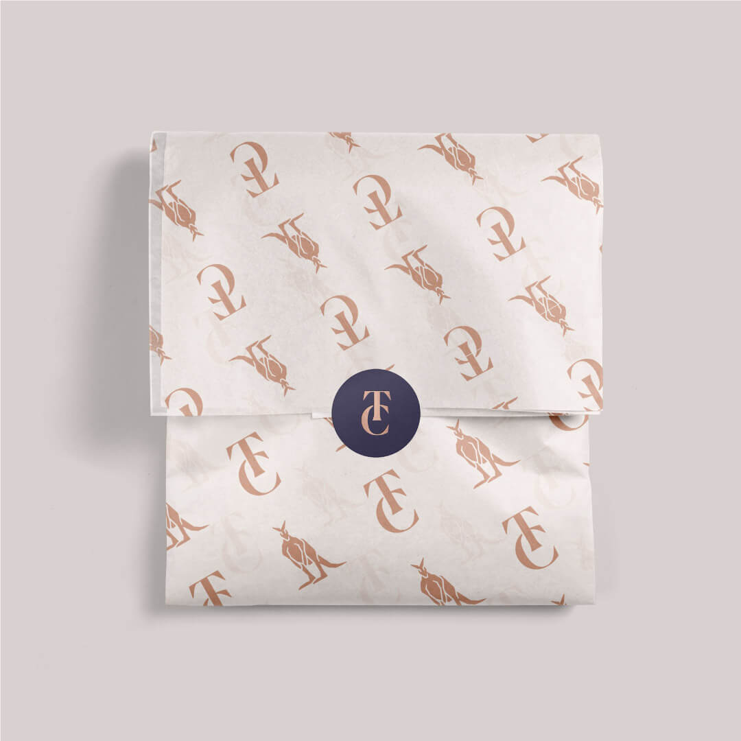 The Cliffs iconography printed as a pattern on some gift wrapping