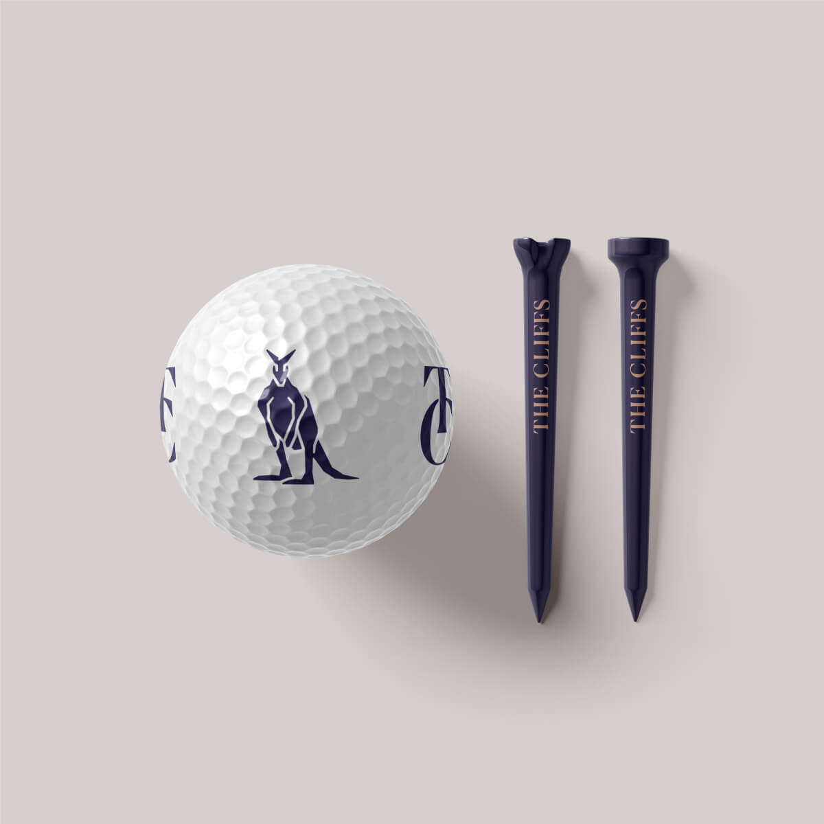 A golf ball with The Cliffs kangaroo icon printed in navy