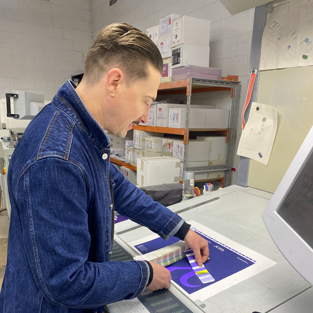 The Adelaide University prospectus being printed.