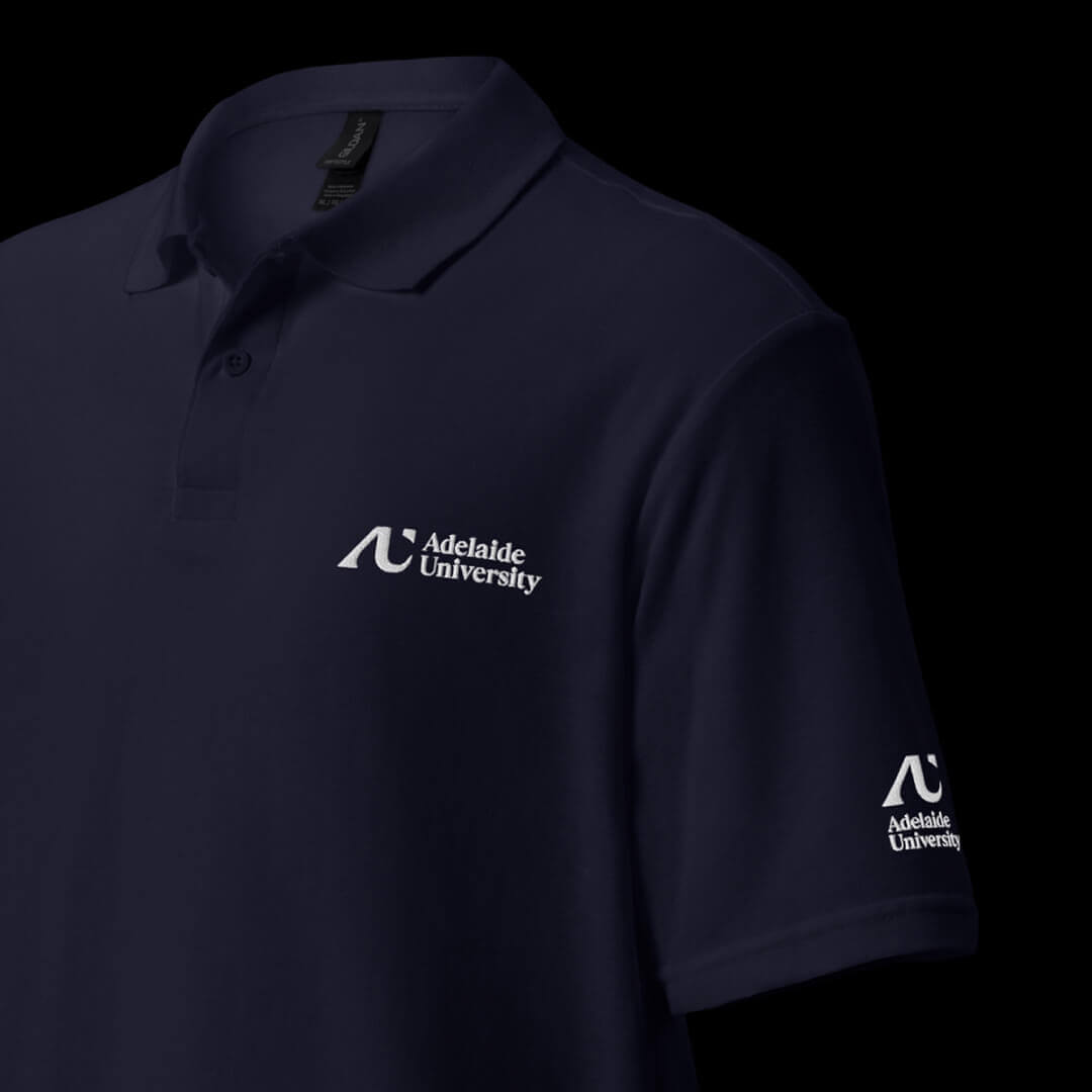 The Adelaide University logo printed on a polo shirt