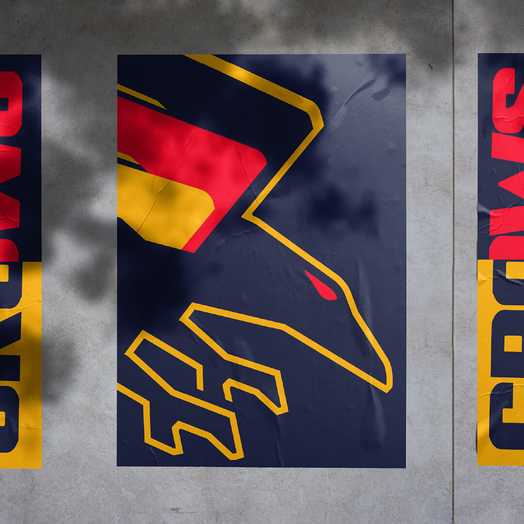 Posters of the 2024 Adelaide Crows branding affixed to a concrete wall